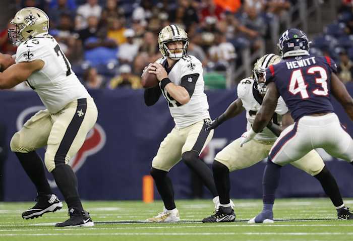 Aug 13, 2022; New Orleans Saints quarterback Andy Dalton (14) looks for a receiver during a game against the Houston Texans. Mandatory Credit: Troy Taormina-USA TODAY